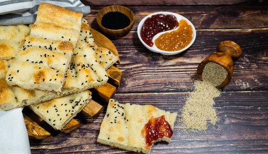 Afghan bread with black seeds, served with jam